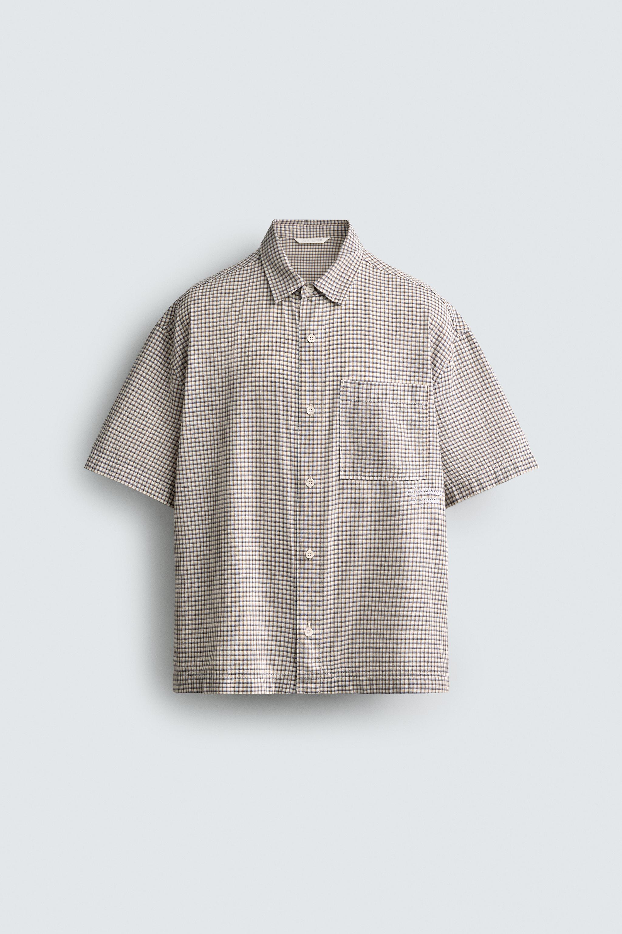 CHEMISE RELAXED FIT À CARREAUX ET INSCRIPTION